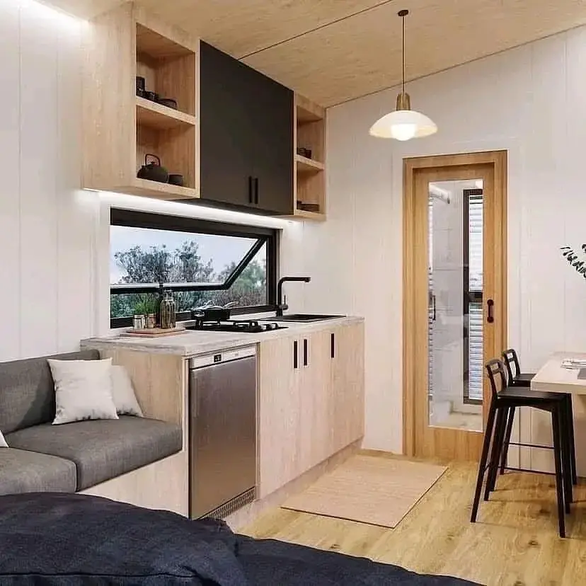 Full kitchenette and living area inside the cabin