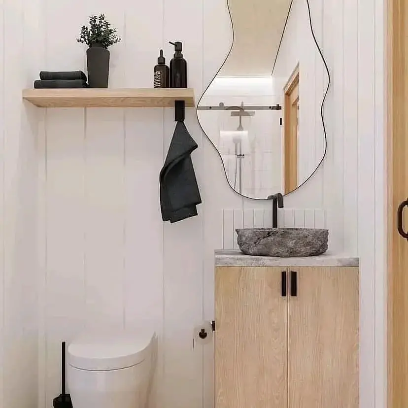 Private bathroom with a vanity, sink, and toilet
